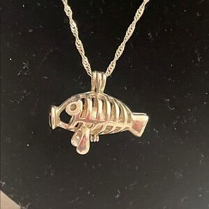 Manatee with caged oyster pearl Necklace